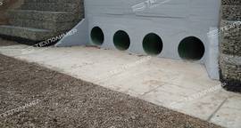 Major rehabilitation of a culvert using the “PipeArm” technology.