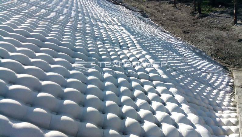 Concrete-filled mats