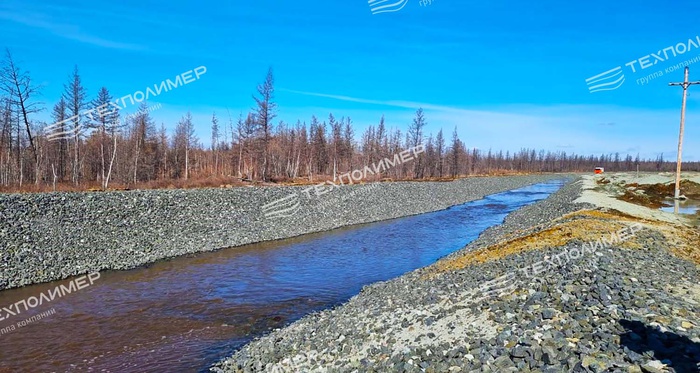 Experience in Designing and Constructing Drainage Channels in Permafrost Areas