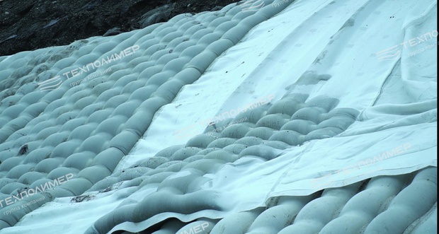 Concrete-filled mats