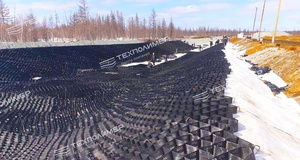 Experience in Designing and Constructing Drainage Channels in Permafrost Areas