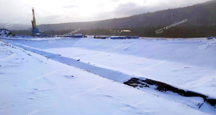 Installation of a Protective Liner for Sludge Pits at the Kovykta Gas Condensate Field
