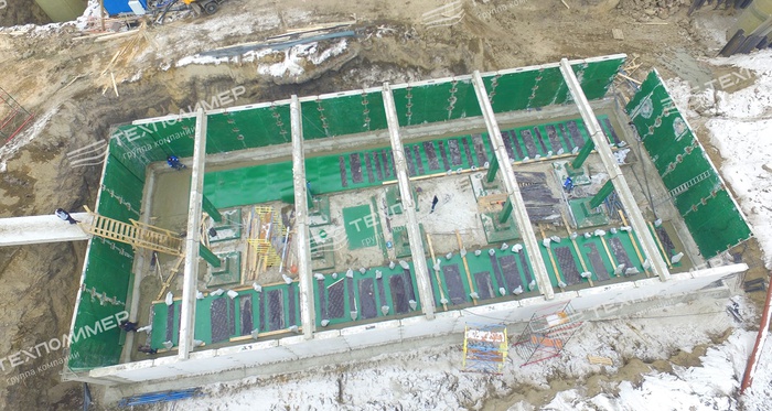 Precast polymer-reinforced concrete stormwater tank