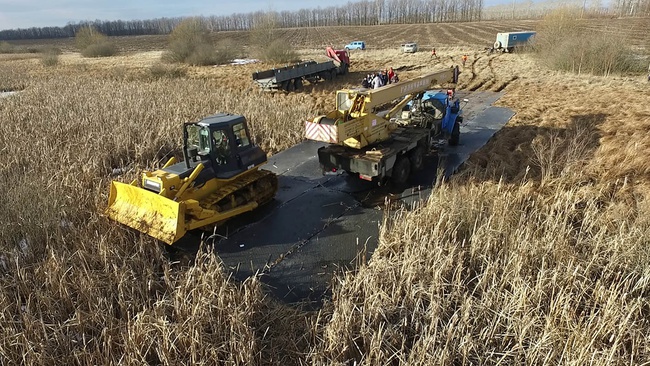 Construction of a temporary access road to the power transmission line construction site