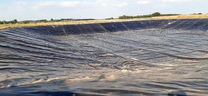 Construction of a storage lagoon at a livestock farm