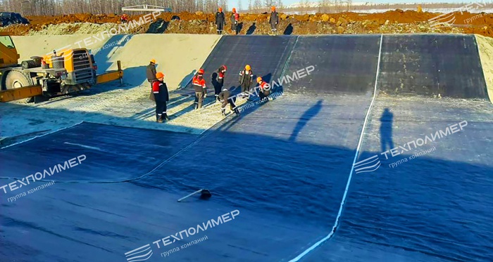Experience in Designing and Constructing Drainage Channels in Permafrost Areas